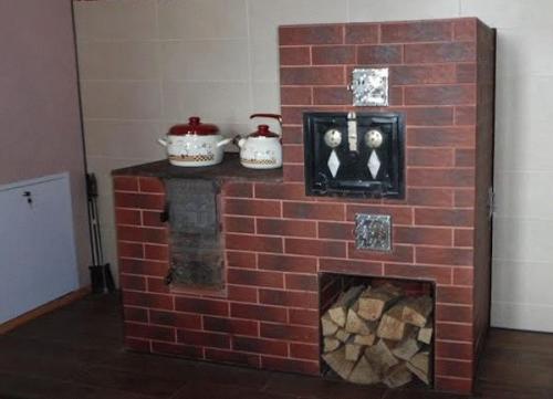 Чем обложить печь в частном доме. Материалы для облицовки