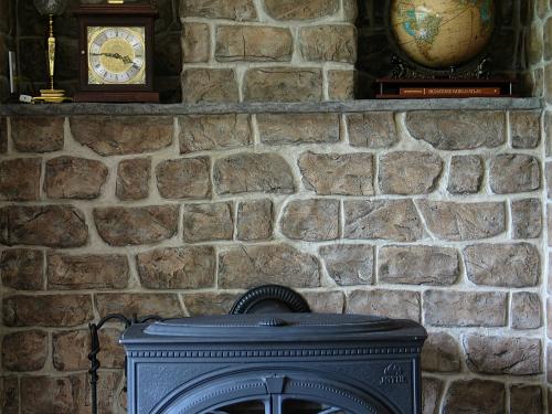 Фасадная штукатурка под камень. Плюсы и минусы штукатурки под камень