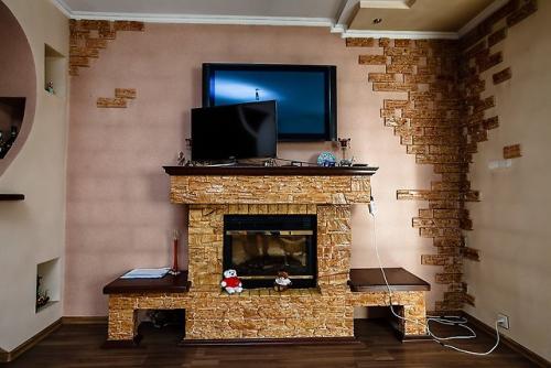 Оформление камина декоративным камнем. Преимущества натурального камня