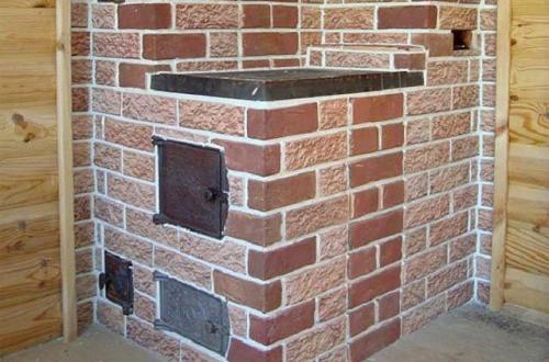 Облицовка камина плиткой. Терракотовая плитка