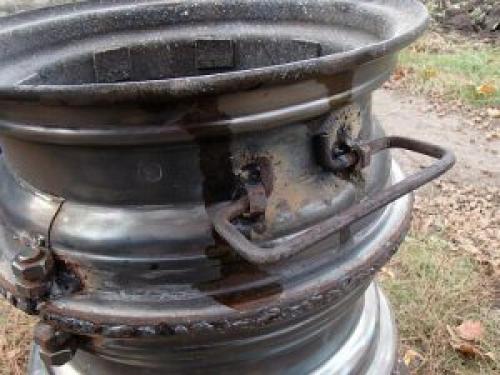 Печь из диско.  Способы изготовления печки из колесных дисков