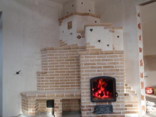Чем сделать облицовку камина. Отделка камина своими руками 09